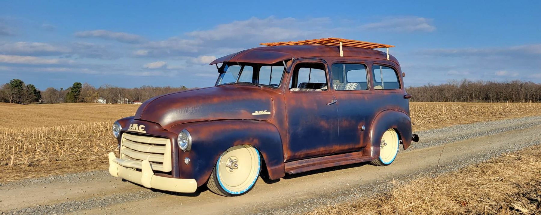 Vintage patina GMC carryall-style truck
